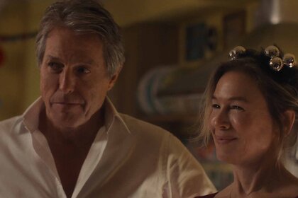 Daniel Cleaver (Hugh Grant) and Bridget Jones (Renée Zellweger) smile in Bridget Jones: Mad About the Boy (2025).