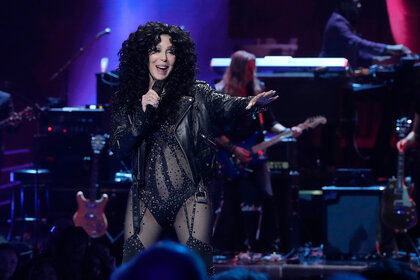 Cher performing on stage during the SNL50: The Homecoming Concer