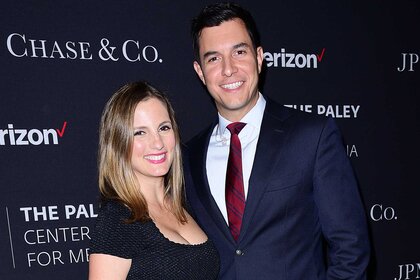 Tom Llamas and wife Jennifer Llamas smiling together at the Tribute to Hispanic Achievements in Television event.