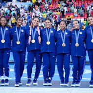 The U.S. Women's Soccer Team pose with their gold medals at the 2024 Olympics