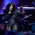 Cher performing on stage during the SNL50: The Homecoming Concer