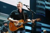 Blake Shelton performing on stage.