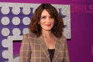 Tina Fey, wears a beige checkered blazer, smiling at the Girls5eva Season 2 Premiere.