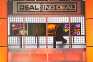 Peter Abbay as the banker on Deal Or No Deal episode 401