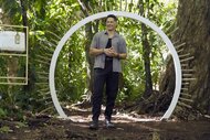 Joe Manganiello stands in an archway on Deal or No Deal Island Episode 105.