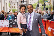 Craig Melvin holds his son Delano