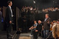 Michael Phelps stands on stage while William Shatner stands in the audience on Saturday Night Live Episode 1532.