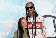 Snoop Dogg with his wife Shante Broadus on the red carpet