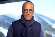 Nightly News anchor Lester Holt in front of a mountain wearing a scarf