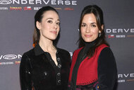 Marina Squerciati and Torrey Devitto pose together on the red carpet at Wonderverse