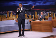 Jamie Foxx playing a game on stage at The Tonight Show Starring Jimmy Fallon.