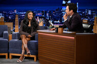 Simone Biles sitting with Jimmy Kimmel on The Tonight Show