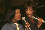 Whitney Houston and Cece Winans sing together.