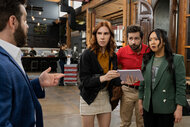 Aj Richie and Ruby all look at a tablet and look shocked on Laid Season 1 Episode 6