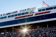 A view of the fans at the grandstands during the NASCAR Cup Series Cook Out 400