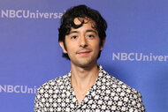 Pablo Castelblanco wears a black and white shirt on the red carpet