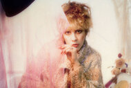 Stevie Nicks poses for a photo backstage in 1985 in Los Angeles, California