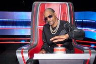 Snoop Dogg presses the button on his chair on The Voice Season 26 Episode 10