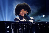 Journeyy plays the piano and sings on stage on America's Got Talent Season 19 Episode 13