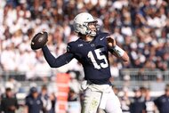 Drew Allar of the Penn State Nittany Lions throws a ball.