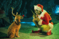 The Grinch (Jim Carrey) with his dog Max in the live- action adaptation of "Dr. Seuss' How The Grinch Stole Christmas,"