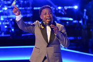 Jaukeem Fortson sings on stage during The Voice Season 26 Episode 12.