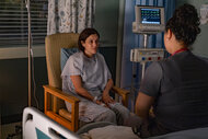 Katie Rodriguez sits in a chair in the hospital on Brilliant Minds Season 1 Episode 10.