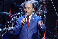 Lee Greenwood sings on stage during the Republican National Convention