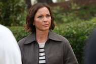 Margaret (Kelli Williams) appears concerned while wearing a striped shirt on Found Episode 211.