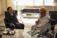 Sharon Goodwin (S. Epatha Merkerson) and Dr. Eleanor Hess (CCH Pounder) sit at a glass desk on Chicago Med Episode 1012.