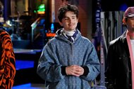 Timothee Chalamet smiles in a blue hoodie on SNL Episode 1876.