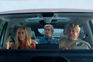 Kristen Wiig, Bill Hader, and Fred Armisen as "The Californians" sit in a Volkswagen vehicle together..