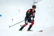 Maximilien Drion skiiing on top of snow during the ISMF Ski Mountaineering World Cup.