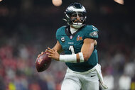 Jalen Hurts during a play on the field during Super Bowl LIX