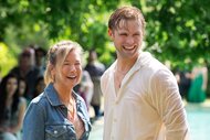 Bridget Jones (Renée Zellweger) smiles next to a wet Roxster (Leo Woodall) in Bridget Jones: Mad About the Boy (2025).