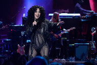 Cher performing on stage during the SNL50: The Homecoming Concer