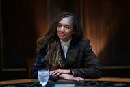 Danielle Reyes at a table with her hands folded on The Traitors Season 3, Episode 10.