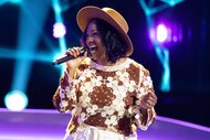 Tinika Wyatt performing on stage on The Voice Season 27, Episode 3.