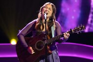 Lucia Flores Wiseman performing on stage on The Voice Season 27, Episode 4.