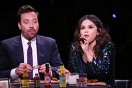 Selena Gomez with Jimmy Fallon eating wings during The Tonight Show Starring Jimmy Fallon Season 6, Episode 150.