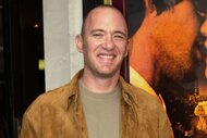 Jim Hanks smiling and posing at the premiere of Swing.