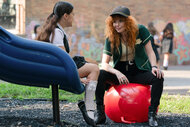 Eva Jade Halford and Natasha Lyonne in a playground on Poker Face Season 2