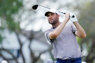 Scottie Scheffler in a backswing during the Arnold Palmer Invitational.