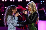 Angie Rey and Tatum Scott performing on stage on The Voice Season 27, Episode 6.