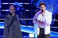 Daruis J. and Britton Moore performing on stage on The Voice Season 27, Episode 6.