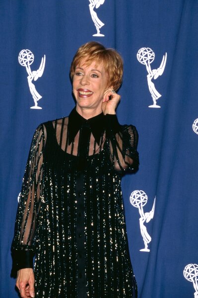 Carol Burnett pulling her left ear at the 48th Primetime Emmy Awards.