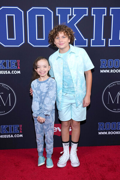 (L-R) Chanel Nicole Marrow and Ryan Buggle pose on a red carpet for new york fashion week