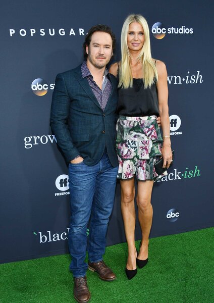 Mark-Paul Gosselaar and Catriona McGinn posing together at the Embrace Your Ish event.