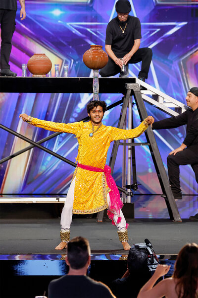 Praveen Prajapat performs on stage on America's Got Talent Episode 1906