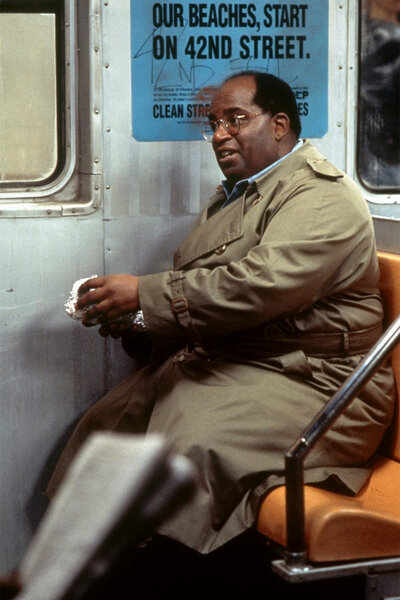 Al Roker sits on a subway car on Seinfeld season 10